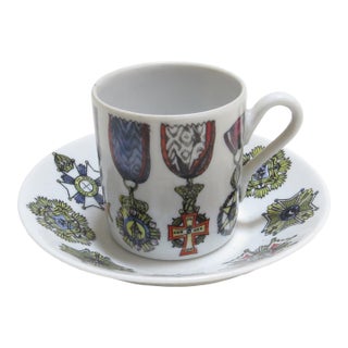 1960's Fornasetti Art/Design on Richard Ginori Fine Porcelain - Al Merito Cup and Saucer For Sale
