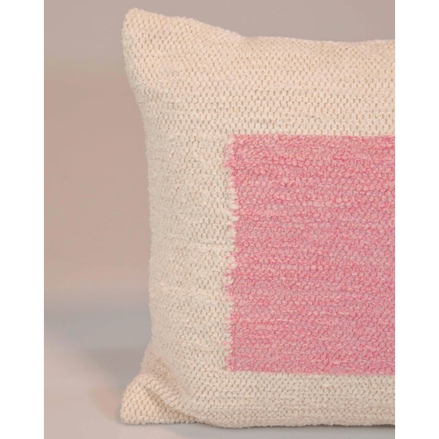 Great, bold, graphic striped pillow made of 100% re-cycled cotton left over form the fashion industry, from one of the...