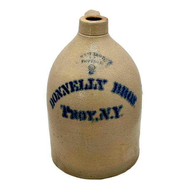Antique American Blue Decorated 2 Gallon Stoneware Advertising Jug by West Troy Pottery Co. New York Circa 1880s For Sale