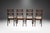 An outstanding set of four mid-century walnut dining chairs in the style of Kent Coffey "Perspecta" circa 1960’s. The...