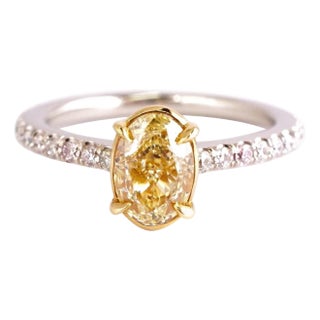 Certified 1.04 Ct Fancy Yellow Oval Cut Engagement Ring in Platinum For Sale