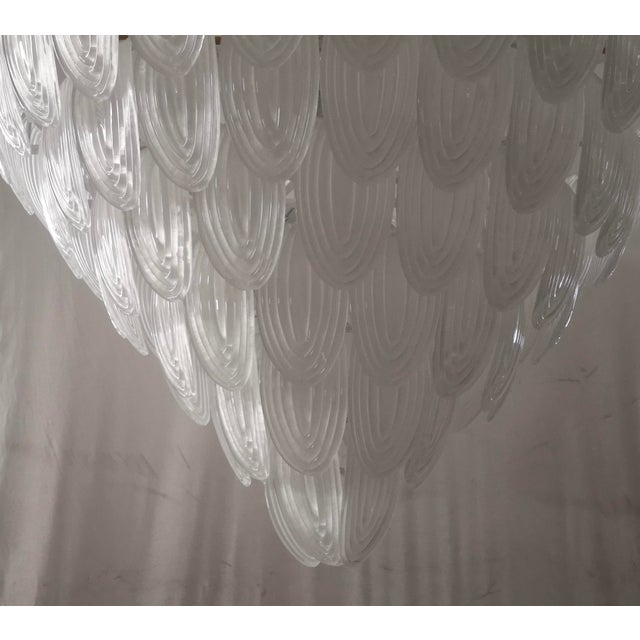 Fantastic transparent Venetian color for a cascade of Murano leaves. A surprising color for this chandelier. All in...