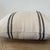 100% Belgian Linen. A beautiful natural pillow with bronze and navy stripes. This pillow has a soft texture. Color: Ecru...