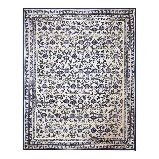 1890s Ivory Background Geometric Blue Floral Design Antique Chinese Peking Rug For Sale