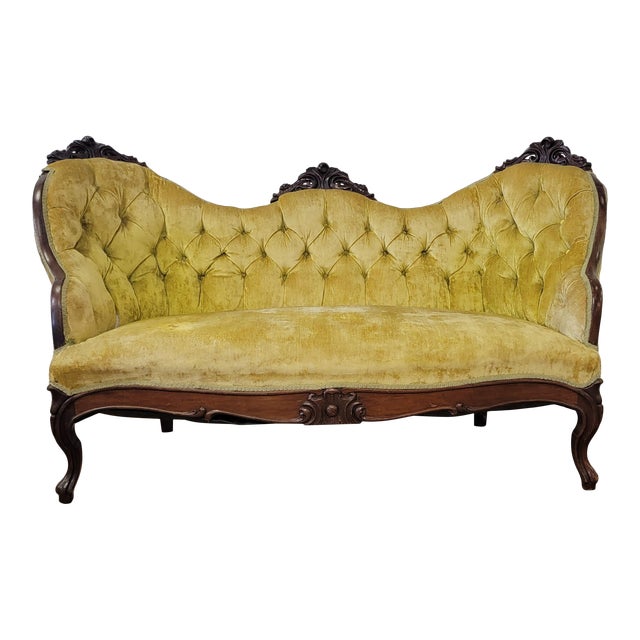 Antique Yellow Loveseat With Carved Wood and Tufted Yellow Velvet