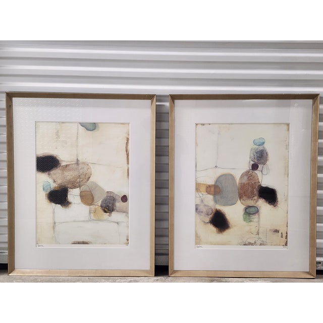 Offering a pair of Lillian August numbered abstract contemporary wall art lithographs by Bailey. The large antique silver...