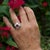 Platinum Ring with 1 oval natural ruby weighing 1.02 carats 37 tapered baguette and round brilliant diamonds weighing...