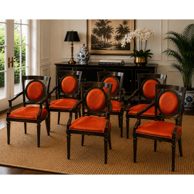 Striking set of six dining armchairs by Minton-Spidell, blending neoclassical elegance with bold Hollywood Regency flair....