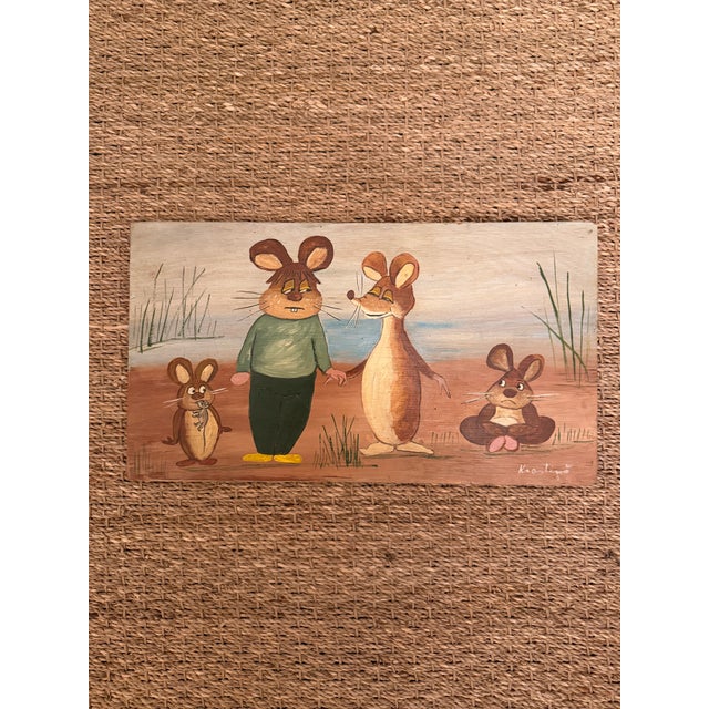 Delightful vintage hand-painted folk art depicting a whimsical family of four mice in a playful countryside setting. Each...
