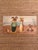 Delightful vintage hand-painted folk art depicting a whimsical family of four mice in a playful countryside setting. Each...