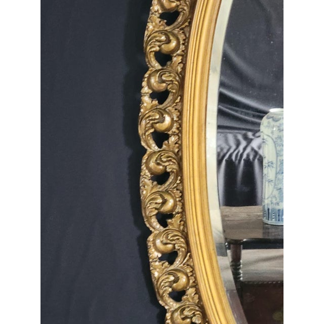 Early 1900s French Style Hand Carved Gilded Oval Beveled Wall Mirror For Sale - Image 12 of 12