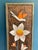 This vintage folk art wood wall panel showcases a beautifully hand-carved floral composition accented by a bird in flight....