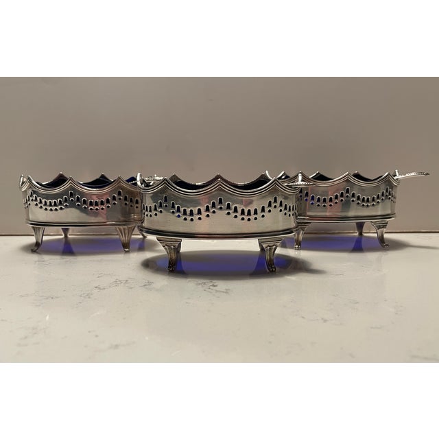 Set of 3 Georgian style antique silverplate master salts with cobalt blue glass liners and three matching silver plate...
