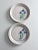 This pair of vintage studio pottery plates is signed by the artist and beautifully hand-crafted. Each plate features a...