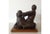 Vintage sculpture made circa 1961. Sculpture of a seated woman in angst, with flowing garb. This piece is much like an...