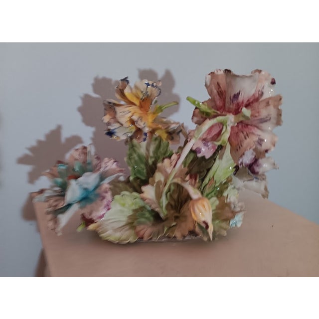 Ceramic flower arrangement 8 " widw=e and 11" wid, part of a collection from Capodimonti Factory in Naples acquiresd in...