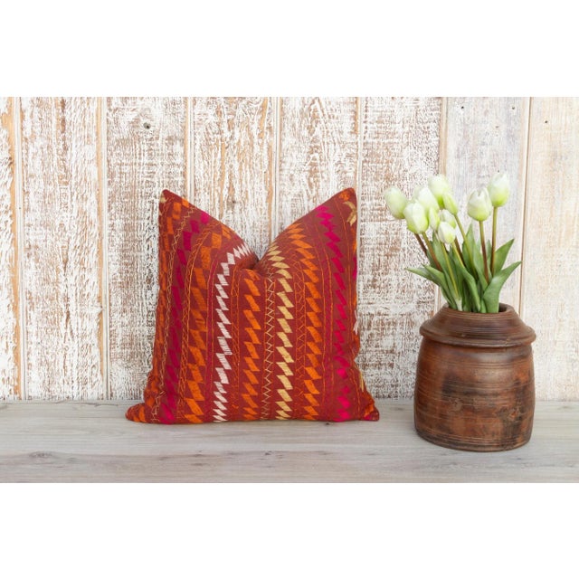 This colorful and luxurious Bagh Phulkari pillow features beautiful hand-done silk embroidery on top of a cotton fabric....