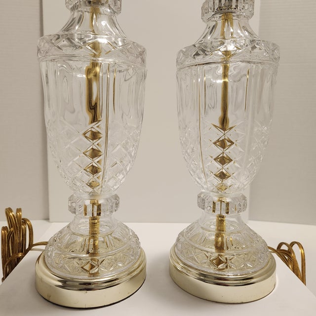 Elevate your space with this stunning pair of small mid-20th-century Hollywood Regency-style table lamps. Perfect for a...