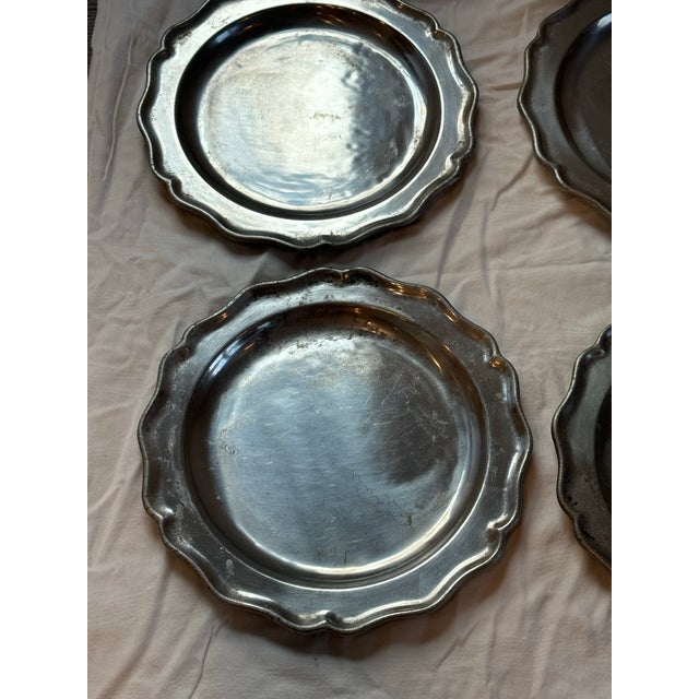 Grace your table scape with these 12 inch scalloped edge pewter chargers. Vintage Pewtarex 6 chargers.