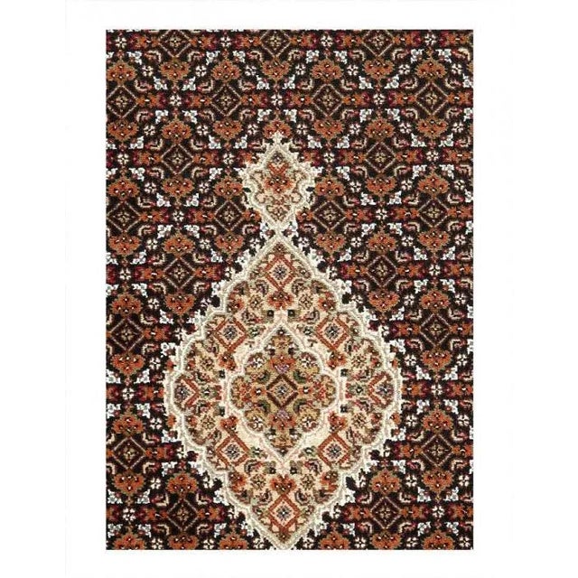 This Tabriz Persian Design Hand-Knotted Wool Brown Area Rug is handmade, hand-knotted. Lamb's wool on a cotton backing...