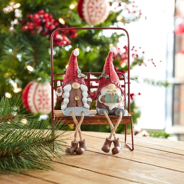 Add a whimsical touch to your holiday decor with this charming set of six Winter Gnome Shelf Sitters! Dressed in festive...