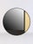 Wall Mirror 031 by Edizioni Design Dimensions: Ø 79 cm Materials: Black wood, brushed brass, black paint Wall mirror made...