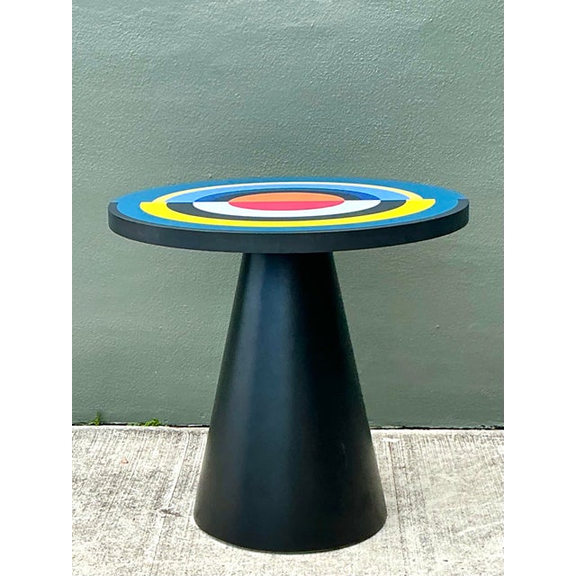 This striking side table from Maison Dada’s "Sonia et Caetra" collection is a masterclass in playful Post-Modernism and...