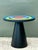 This striking side table from Maison Dada’s "Sonia et Caetra" collection is a masterclass in playful Post-Modernism and...