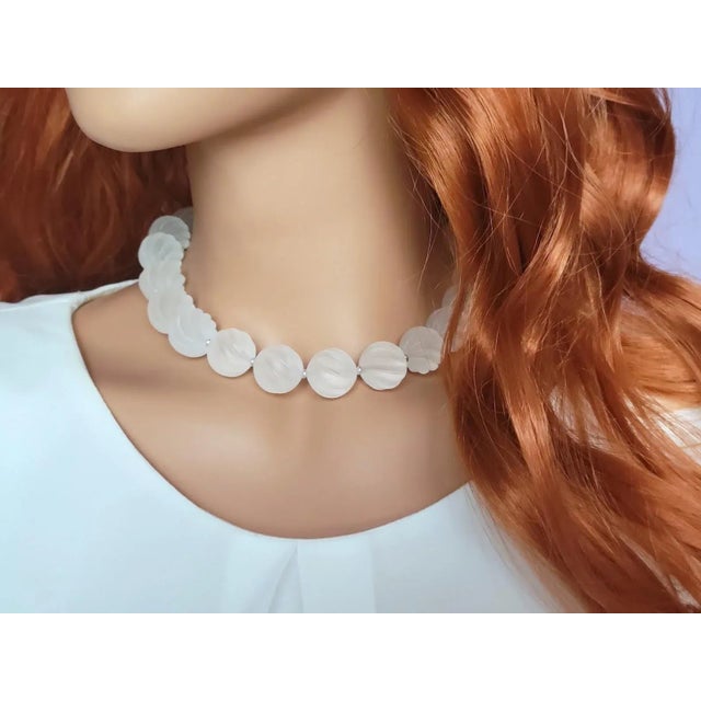 Genuine Swirl Carved Frosted Rock Crystal Beaded Necklace with Beautiful Mother of Pearl Toggle Clasp The length of the...