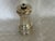 A sterling silver pepper mill. The top unscrews and the top lifts off so that it can be filled with peppercorns. The word...
