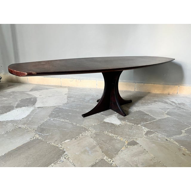 Coffee Table in dark wood vintage 50s Slightly ovalized Ideal for refined and refined environments