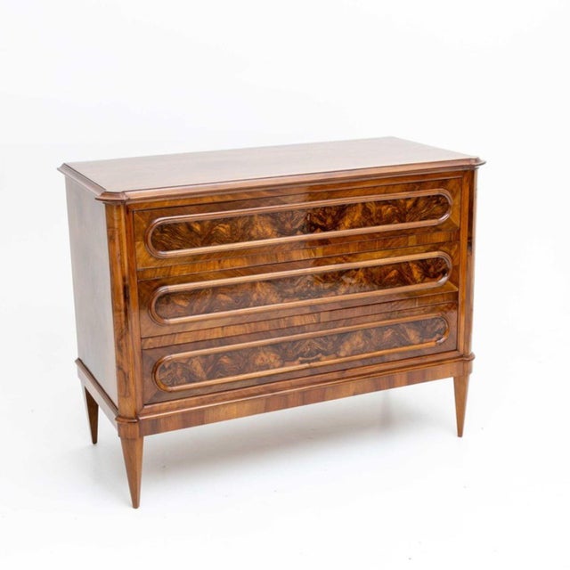 Fine Pair of Late 19th Century three drawer chests. Beautiful carved mouldings and tapered leg details. Walnut and walnut...