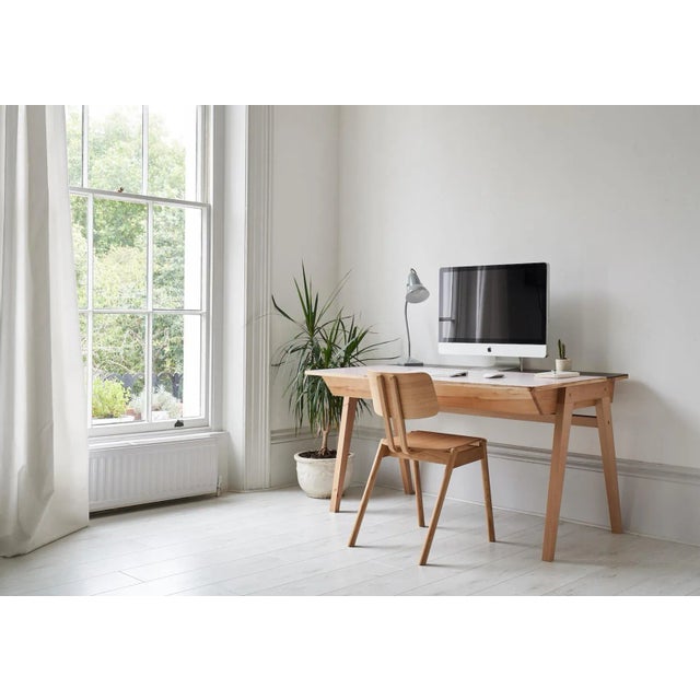 King & Webbon's take on a design classic adapted for modern living. The inkwell not only looks great but acts as cable...