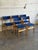 Beautiful set of 5 vintage Danish modern dining chairs crafted in Denmark, featuring sculptural solid wood frames and...