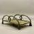 A vintage textured brass tray edged with looped brass ropes ending in tassel feet which could be used for holding towels,...