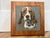 Brown-and-white beagle rendered on a textured gray slate tile, mounted inside a warm-toned wooden frame. specializes in...