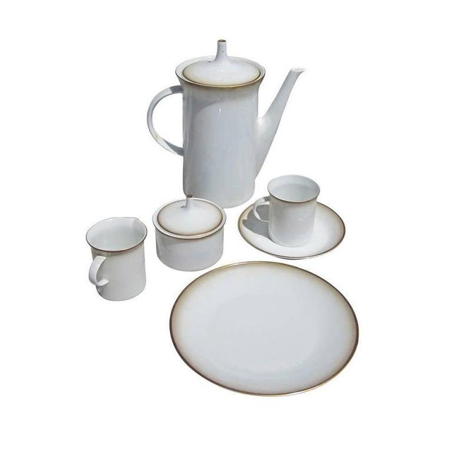 Vintage coffee set designed by Kontrollstelle for Rosenthal Germany. The porcelain set comes in a bone white and taupe...