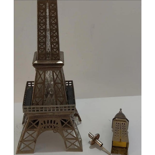 For your consideration. . . A rare vintage musical decanter designed in the form of France's iconic landmark the Eiffel...