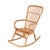 Elegant mid-century French Riviera rocking chair in rattan and bamboo. This fantastic piece was designed and manufactured...