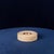 Overview A sculptural round ashtray made in Italy in 1970, featuring a solid travertine body with concentric carved rings...