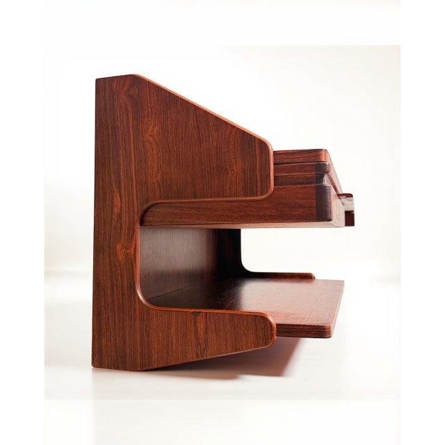 Wall-mounted nightstand in rosewood | attr. Østergaard | denmark, 1960s danish wall-mounted nightstand in rosewood...