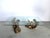 Stunning mid 20th century italian coffee table in the form of two female blackamoor mermaids supporting a large clear...