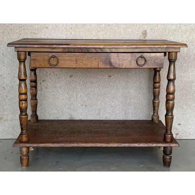 Spanish Country side table with drawer and low shelve. Made of antique pine called "mobila", this table is very functional...