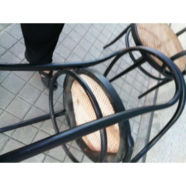 Two Thonet 209 chairs or armchairs. Beech chairs made of bentwood and Vienna straw. I don't know its origin or the exact...