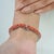 Metal Carat&Her Vibrant 25.7 Ct Round Scarlet Coral Tennis Bracelet in 925 Sterling Silver For Sale - Image 7 of 13
