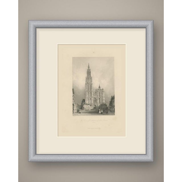 The west front of the Cathedral of Our Lady in Antwerp is shown head on, its single completed north tower soaring to a...