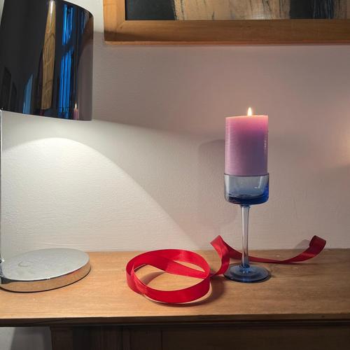 Sherringham blue glass candle stick holder in dark blue. Holds 1 candle with iconic disc shape dimensions Height 15cm...