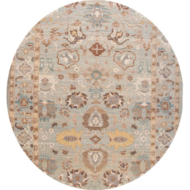 Beautiful modern Sultanabad rug with a light blue and beige field with multicolored accents and all-over floral design....