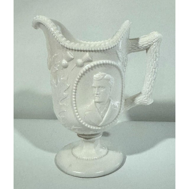 Very pale pink milk glass milk jug by Henry Greener & Co., c. 1878. Features portraits of Queen Victoria's daughter,...