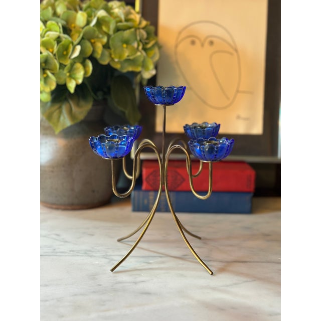 A spectacular and rare mid-century Scandinavian modernist centerpiece, this 5-light candelabra was designed by celebrated...